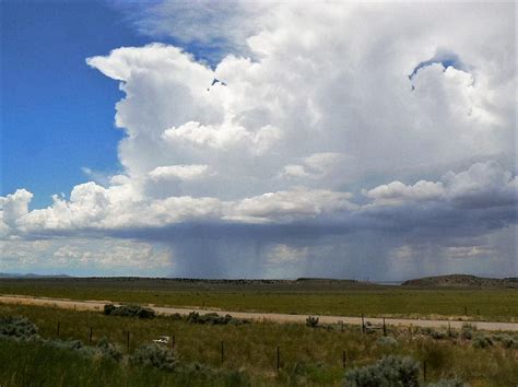 Cumulonimbus Rain Cloud Photograph by Deborah Moen - Pixels