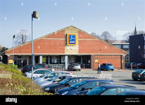 Aldi Store Front With Cars In Car Park Outside Supermarket Selling At Cheaply Bangor Gwynedd