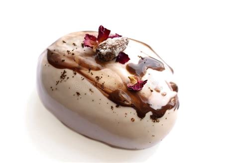 Caramel Coffee And Chocolate Stone Dessert With Almonds And Rose