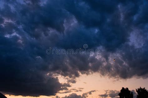 Dramatic Shot of Dark Clouds before Storm, at the Sunset Stock Photo ...