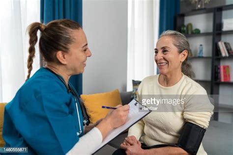 Nurse Providing Care Photos And Premium High Res Pictures Getty Images