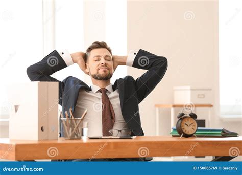 Happy Businessman At Table In Office Time Management Concept Stock