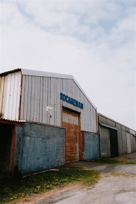 Abandoned Warehouse Facade · Free Stock Photo