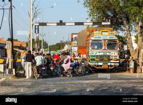 People Wait At The Railway Crossing Near Fatehpur Sikri India Stock