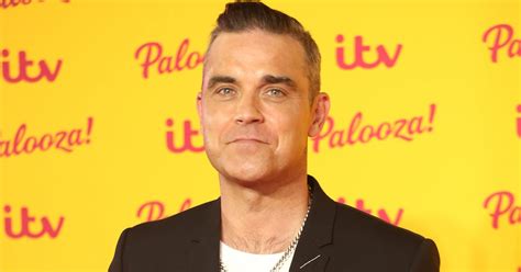 Robbie Williams Strips Off To Reveal Something Huge Entertainment Daily