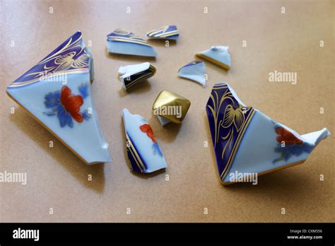 Broken porcelain piece Stock Photo - Alamy