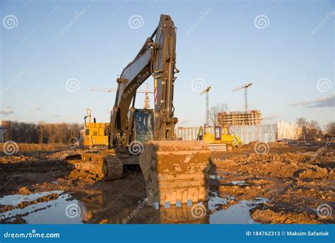 Excavator And Dozer Working At Construction Site On Earthworks Backhoe