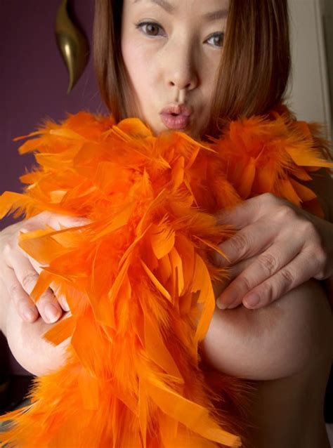 Busty Asian Babe Posing In Red Lingerie