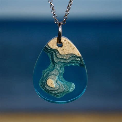 Designer Handcrafts Beach-Inspired Jewelry From Sand and Resin