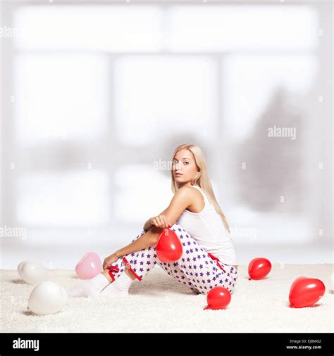 Blonde Woman With Balloons Stock Photo Alamy