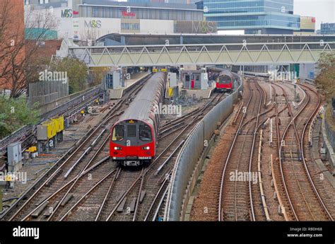 A London Underground Train Departs From Stratford Station With A