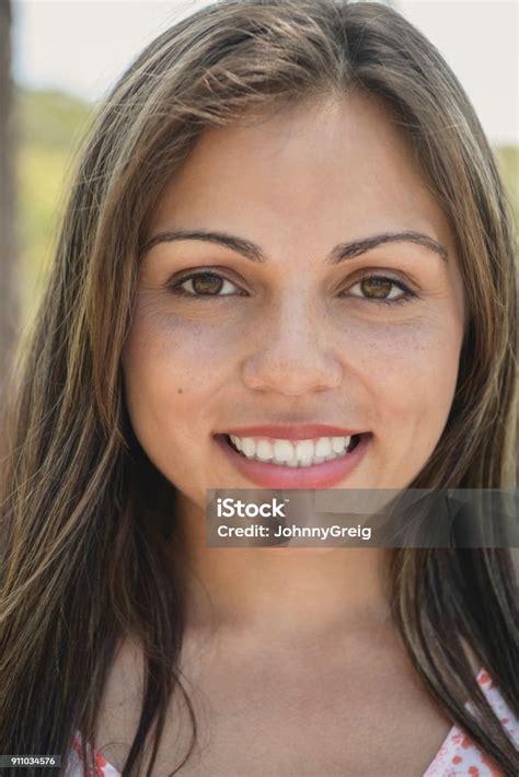 Portrait Of Young Aboriginal Australian Woman Smiling At Camera Stock