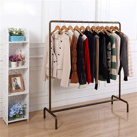 Гардеробная вешалка для верхней одежды 92 фото