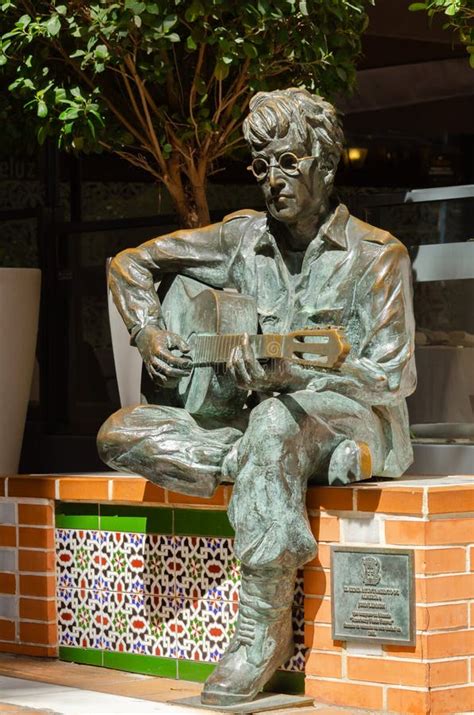 Almeria Spain April A Bronze Statue Of John Lennon Sitting