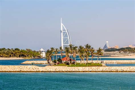 Waterfront View Of Burj Al Arab Under Cloudy Sky Seven Star Hotel A