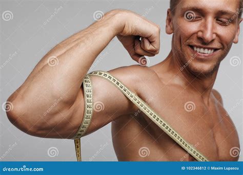 Cheerful Man Measuring Bicep Stock Photo Image Of Bicep Muscular