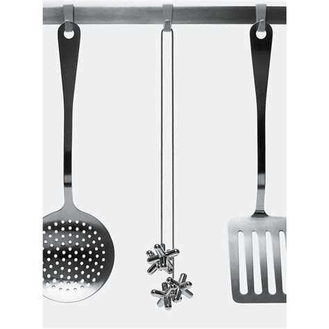 Tripod Trivet With Adjustable Elements By Alessi Design Is This