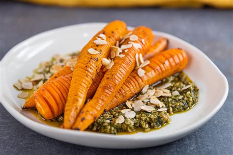 Spiced Hasselback Carrots With Rocket Basil Pesto Everyday Gourmet