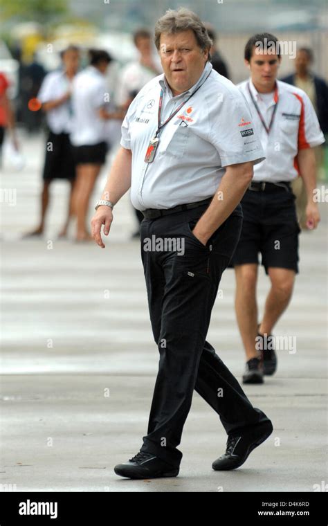 Germany?s Norbert Haug, Mercedes Motorsport Director walks through the ...