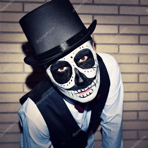 Man with calaveras makeup Stock Photo by ©nito103 85530878