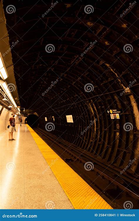 Vertical Inside View Of The Toronto Subway At Night Passengers Waiting