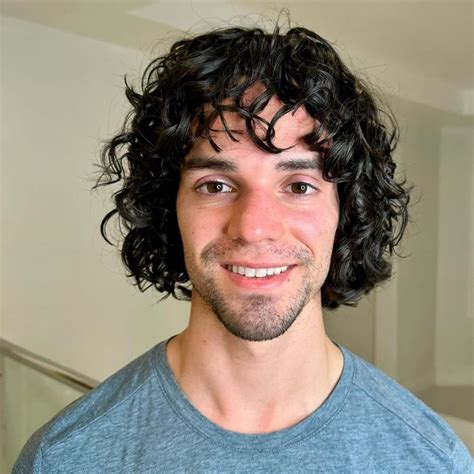 17 Most Stylish Haircuts For Men With Curly Hair