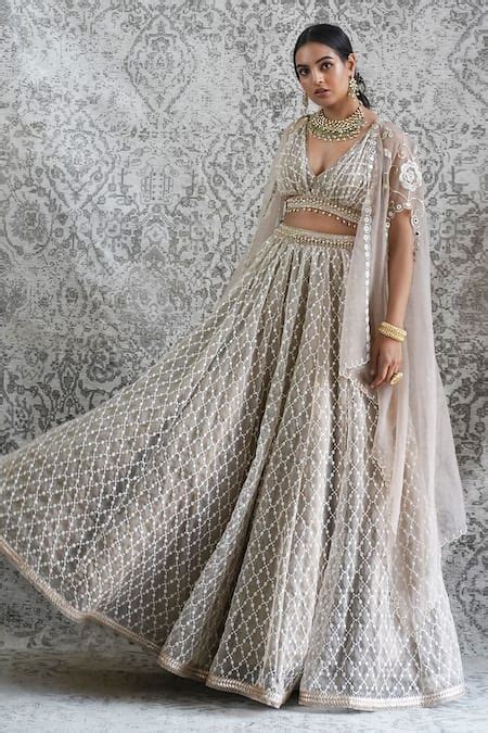 Buy Beige Organza Embroidered And Embellished Zari Cape Open Lehenga