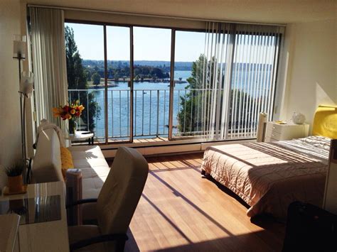 Bedroom With Waterfront View