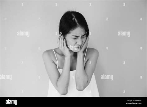 Asian Woman Having Earache Or Ear Pain In Black And White Tone Healthcare And Medical Concept