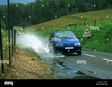 Car Splashing Through Water Stock Photos Car Splashing Through Water