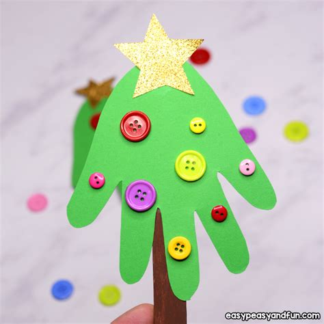 Handprint Christmas Tree Christmas Craft For Kids Or A Diy Ornament