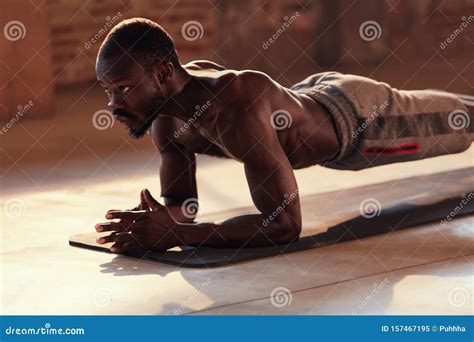 Sport Man Doing Plank Exercise On Fitness Workout At Gym Stock Image