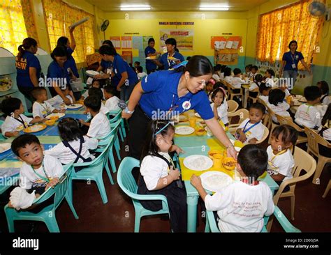 Philippines Feeding Program High Resolution Stock Photography and Images - Alamy