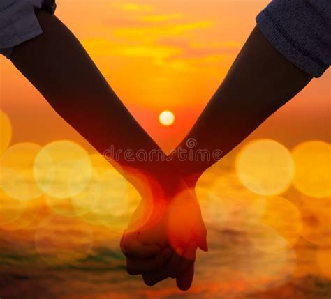 Couple Holding Hands At Sea Sunset Stock Photo Image 40758693