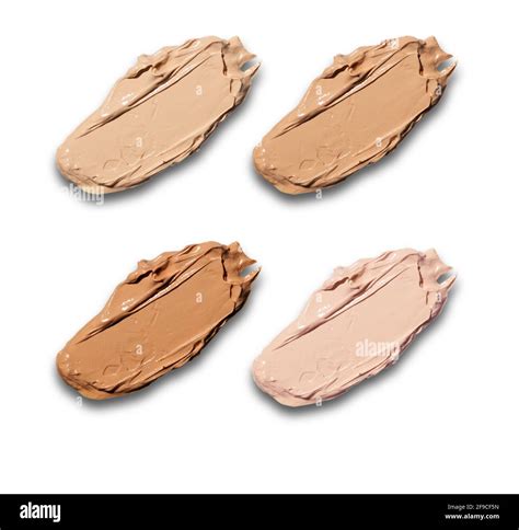 A Set Of Foundation Swatches In Different Shades Isolated On A White