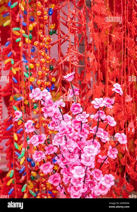 artificial peach blossoms on a branch for chinese new year Stock Photo ...