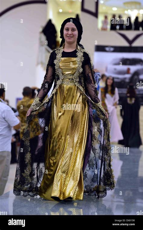 Sanaa, Yemen. 15th Mar, 2014. A model presents traditional Yemeni ...