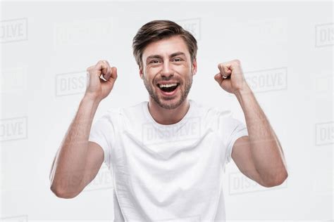 Handsome Cheerful Man Celebrating Success Isolated On White Stock