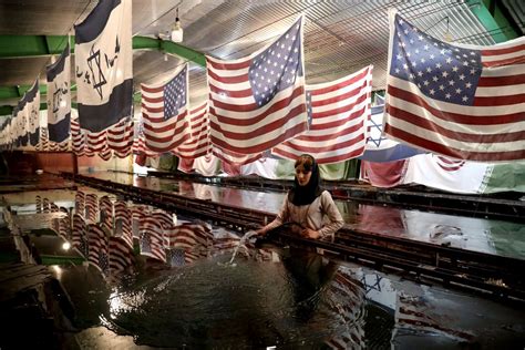 Fire Sale An Iran Plant Makes The US Flags Protesters Burn