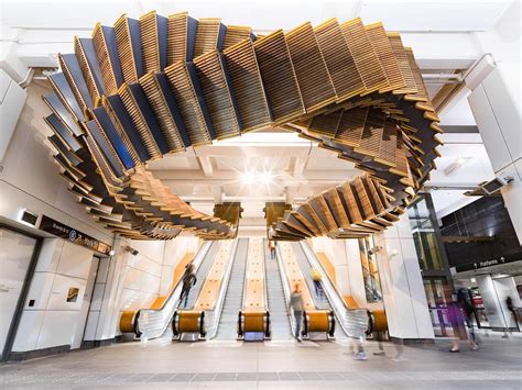 A Beautiful Historic Wooden Escalator Sculpture Suspended Above Its ...