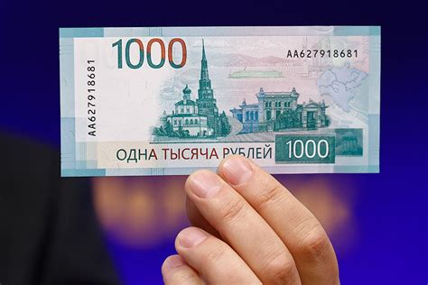 ЦБ показал новые купюры номиналом 1000 и 5000 РБК