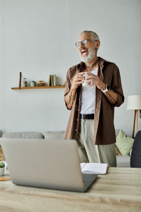 A Mature Gay Man With Tattoos Stock Photo Image Of Technology Happy 333052708