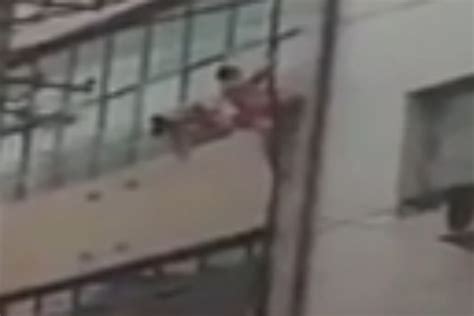 NAKED Man Filmed Shimmying Down Drainpipe Outside Flats To Escape Scorned Lover S Husband And