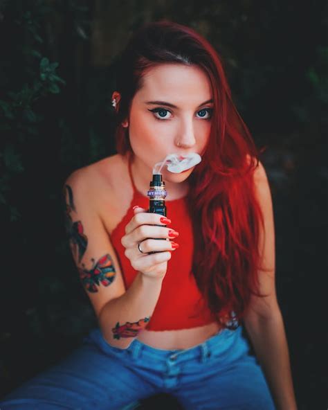 Woman with E-Cigarette · Free Stock Photo