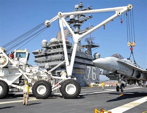 Retrowar — Sailors Use The Crash And Salvage Crane To Lift A