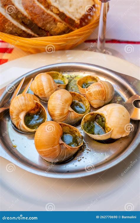 Starter Dish In Traditional Restaurants On Burgundy Snails Cooked With