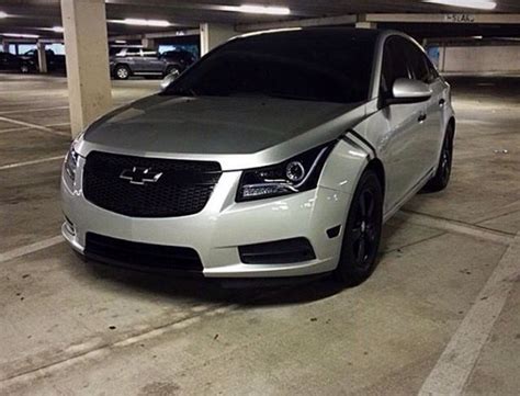 Chevy Cruze Silver Paint Job In Parking Garage