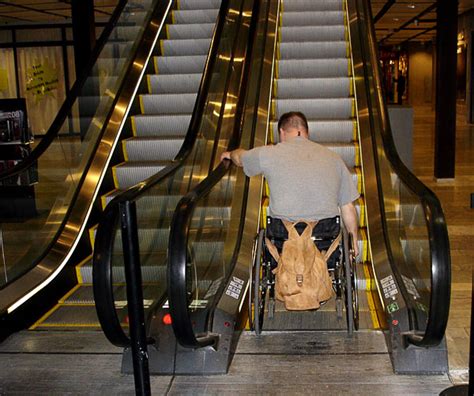 Ride On Escalator With Manual Wheelchair Spinalistips