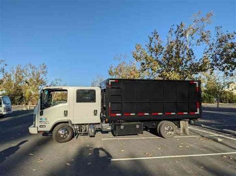 ISUZU NPR-HD CREW CAB DIESEL DUMP TRUCK (2016) : Medium Trucks