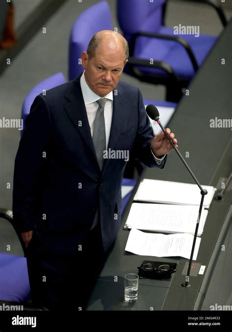 German Finance Minister Olaf Scholz takes questions as part of a ...